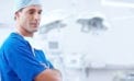 Doctor standing with folded arms COVID-19 lessons can improve health, legal systems